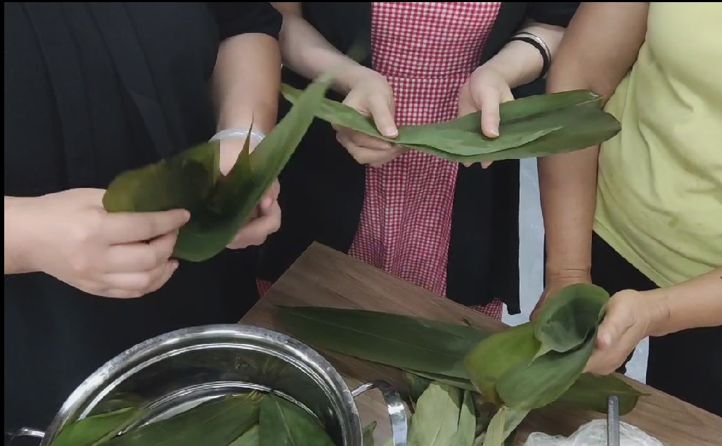 广西越知网络股份有限公司端午节“学习包粽子”活动圆满完成